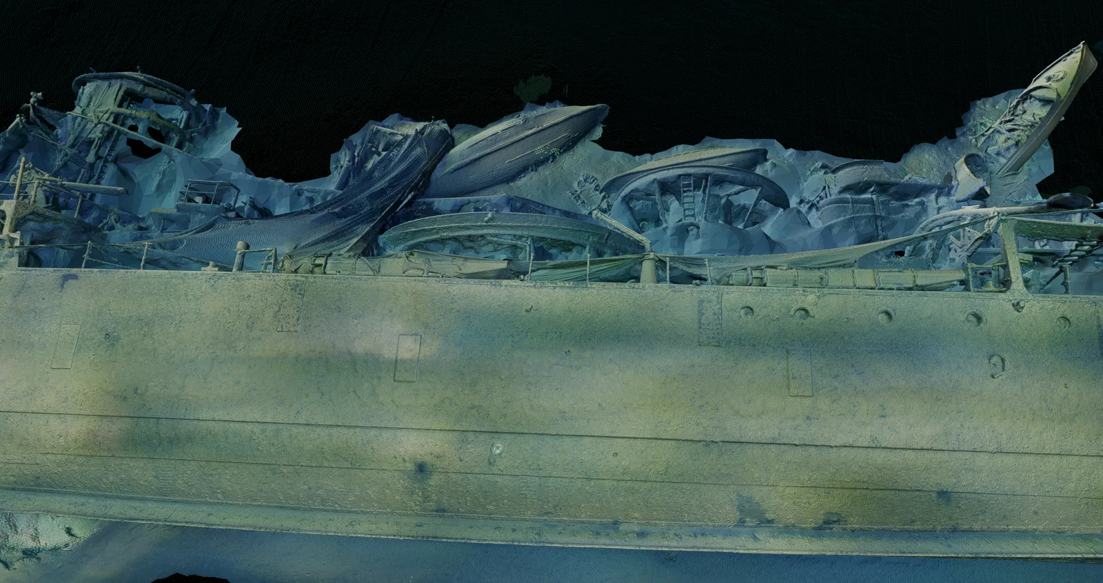 Fotogrammetrisk 3D-modell där torpeder syns som långa tubformade föremål bland vrakdelarna